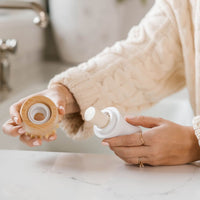 someone changing out the soap refill for their Nellies dish stick