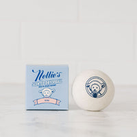 Nellie's Rose Scented Dryerball made with pure Rose essential oil beside Nellie's Lavender Scented Dryerball packaging
