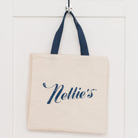 Nellie's cream coloured grocery style tote with Nellie's logo 