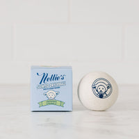 Nellie's Lemongrass Scented Dryerball made with pure lavender essential oil beside Nellie's Lemongrass Scented Dryerball packaging