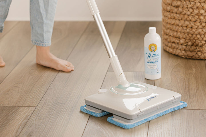 Mopping the floors with Nellie's WOW Mop and Floor Care.