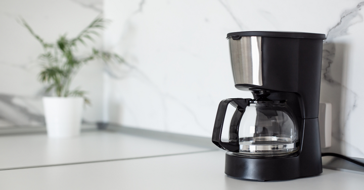 A coffee maker on a counter. 